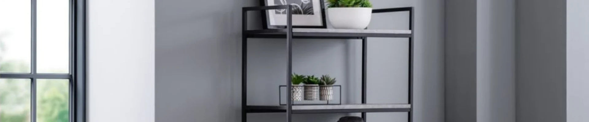 A collection of stylish wooden bookcases and shelving units ideal for home and office organization.