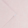 Non-woven wallpaper in soft blush color palette