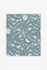 Elegant floral wallpaper in blue with layered design and chalky matt finish