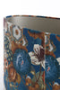 Make a statement with this captivating table lamp that seamlessly combines art and functionality. The Jamiri base serves as a true conversation piece, boasting a mesmerizing design that invites intrigue and admiration. Its intricate details, from the intertwining curves to the subtle etchings, showcase the dedication and skill of the artisan. 