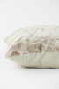 A close-up of the Florian Cushion in Sand 60x30cm, showcasing its soft texture and stylish design.