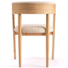 Cofra Danu dining chair in neutral fabric on a natural oak frame