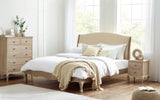 Transform your bedroom into a sanctuary of style and comfort with the Camille King Size Bed 5ft. Its timeless French design, complete with a limed oak frame and an upholstered oatmeal linen headboard, ensures a luxurious sleep experience. Shop for the finest king size bed frame available.
