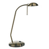 Visualize the vintage appeal of the Journal Table Lamp in Antique Brass. Its antique finish and classic design make it a standout addition to any room, offering both style and adjustable functionality.