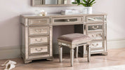 Complete your vanity set with the Jessica Dressing Table Stool. Its charming design, featuring a cushioned seat upholstered in a chic fabric, adds a touch of elegance to your daily beauty routine.