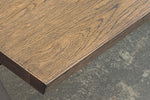 Transform your dining space with the Reno Dining Table featuring star-shaped legs