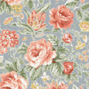 Ochre Yellow Wild Roses wallpaper adorned with sprays of roses, magnolias, and fuchsias, complemented by scattered butterflies.