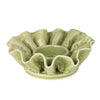 Delicate candle holders shaped like blooming flowers

