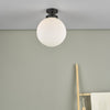 Alrik Bathroom Flush Matt Black Opal Glass IP44 life style picture