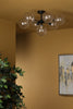 Cohen 7 Light Pendant Black/Clear Dimpled Glass picture with switched off light