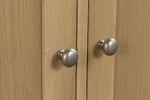 Oak sideboard cabinet with sleek metal accents
