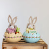 Whimsical Easter bunny baby in egg ornament for seasonal homeware

