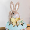 Handcrafted Easter bunny baby in egg figurine for spring celebrations

