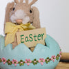 Colorful Easter bunny baby in egg decoration for holiday charm


