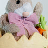 Colorful Easter Bunny Baby Girl in Egg ornament for holiday charm.

