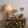 Ely Table Lamp Blue/White Base Only life style picture with a shade (not included)