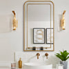 Sophisticated gold mirror enhancing your home decor
