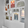 Premium wall paint with a red undertone and blue pigments.
