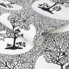 Black and white tree wallpaper by Graham & Brown for home decor

