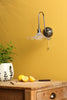 Hadano Wall Light Antique Chrome and Wavy Glass with a ball-and-chain pull cord switch