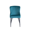 Stylish peacock fabric dining chairs with quilted back design
