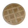 Round kitchen table with warm oak wood tones
