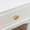 Monroe 1 Drawer Accent Table Stone close view picture of the drawer with a gold handle