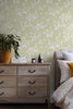 Neutral sage green wallpaper with off white detailing