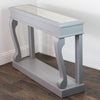 "Wood console table in warm mink finish"

