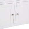 Functional storage with this medium white sideboard.