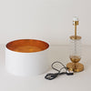Minimalist table lamp for ambient lighting.