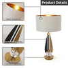 Minimalist table lamp for subtle illumination.