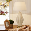 Minimalist table lamp for subtle illumination.