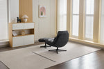Turner Swivel Accent Chair Dark Grey life style back view photo with footstool