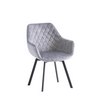 Elegant velvet dining chairs with a chequered pattern design.
