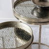 Contemporary nesting tables with diamond accents.