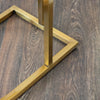 Modern sofa table with sturdy metal base
