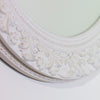 Beautiful round mirror with a cream finish, perfect for hallways and living rooms.

