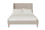 Wooden super king bed featuring soft curved edges.