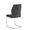 Sleek leather dining chairs with a quilted finish and chrome legs.
