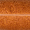 Tonal copper cushion, handmade sophistication.