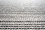 Create a cozy ambiance with soft area rugs