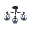 Black semi flush mount ceiling light with dented glass shade
