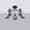 Black semi flush mount ceiling light with dented glass shade
