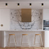Modern lighting fixture with a black and gold color scheme
