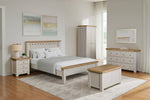 Double wardrobe Doune 2-Door Wardrobe Taupe with oak veneer top.

