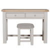 Comfortable dressing table stool seat in taupe fabric.
