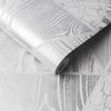 Elegant geometric wallpaper with wood grain texture and metallic details
