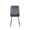 Upholstered dining chairs in grey with sleek black legs
