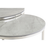 Modern nest of coffee tables with a sleek circular design.
